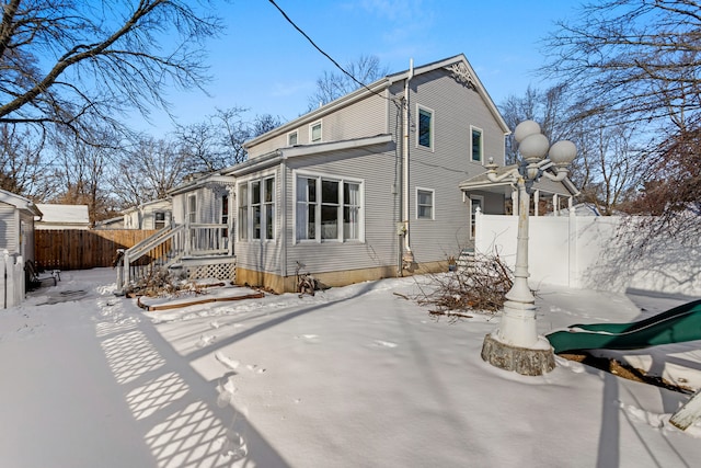 view of snow covered property