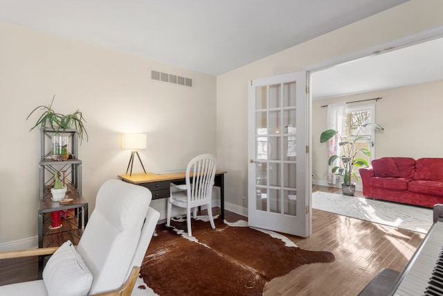 office space featuring hardwood / wood-style floors