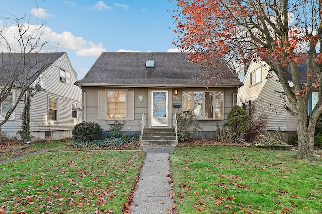 view of front of home with a front yard