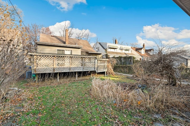 rear view of house with a deck