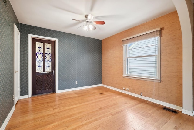 entryway featuring light wood-type flooring and ceiling fan