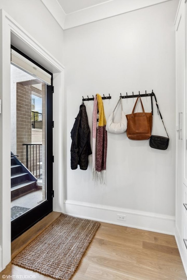 mudroom with hardwood / wood-style flooring