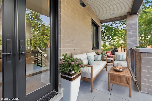 balcony with outdoor lounge area and a porch