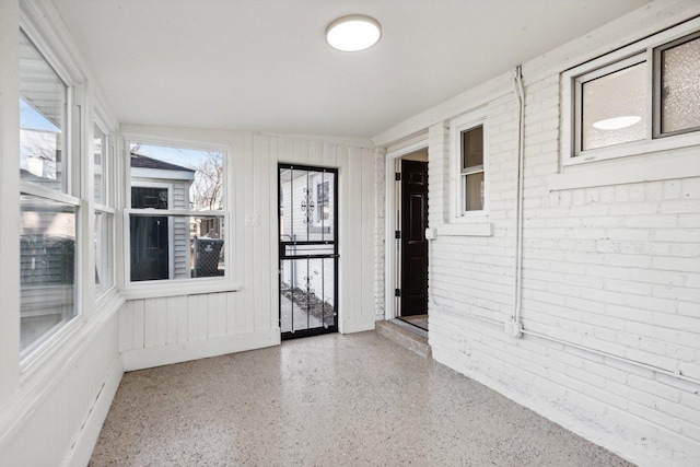 view of unfurnished sunroom