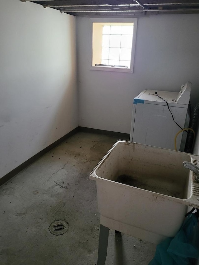 laundry area with washer / dryer and sink