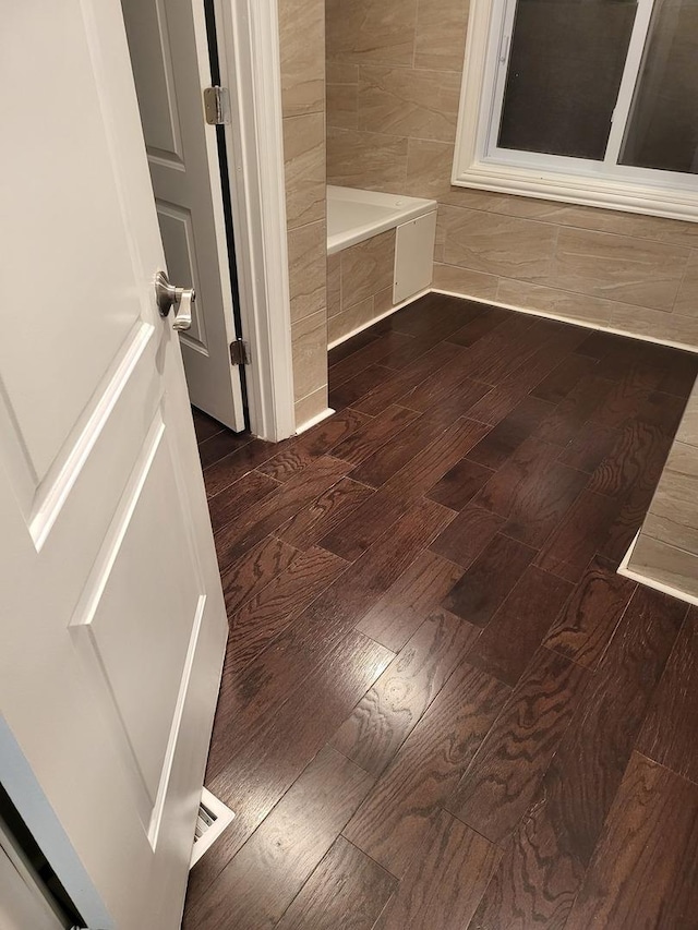 interior space with dark hardwood / wood-style floors