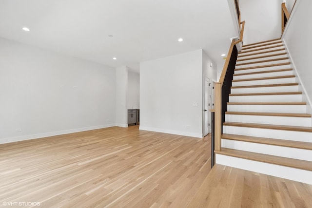 unfurnished living room with light hardwood / wood-style floors