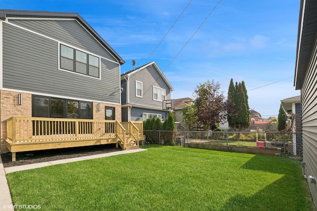 view of yard with a wooden deck