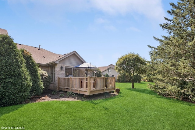 view of yard featuring a deck