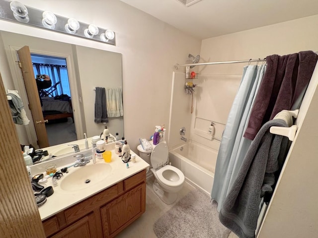 full bathroom with vanity, shower / bathtub combination with curtain, and toilet