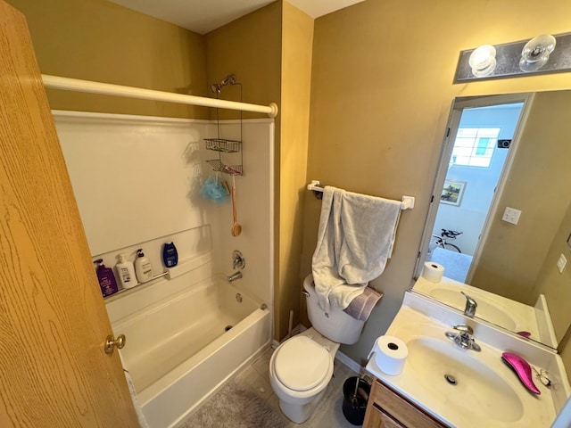 full bathroom featuring tile patterned flooring, vanity,  shower combination, and toilet