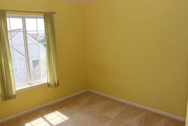 unfurnished room with carpet