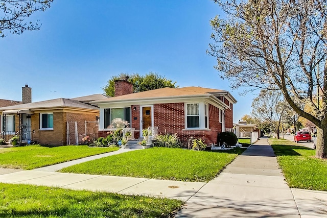 view of front of home with a front yard