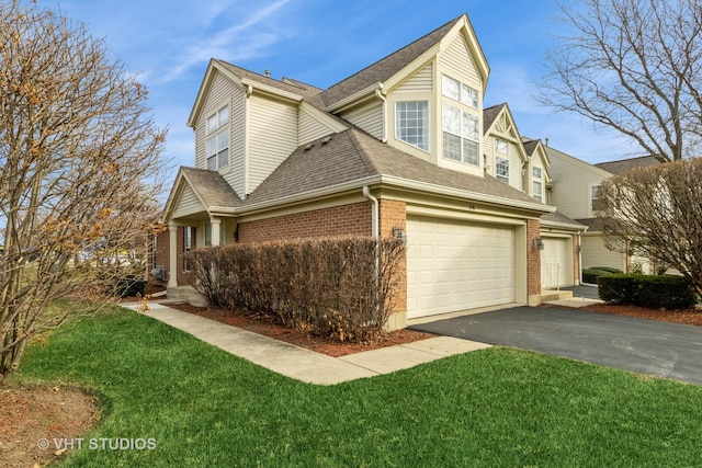 view of home's exterior with a lawn and a garage