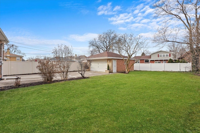 view of yard with a garage