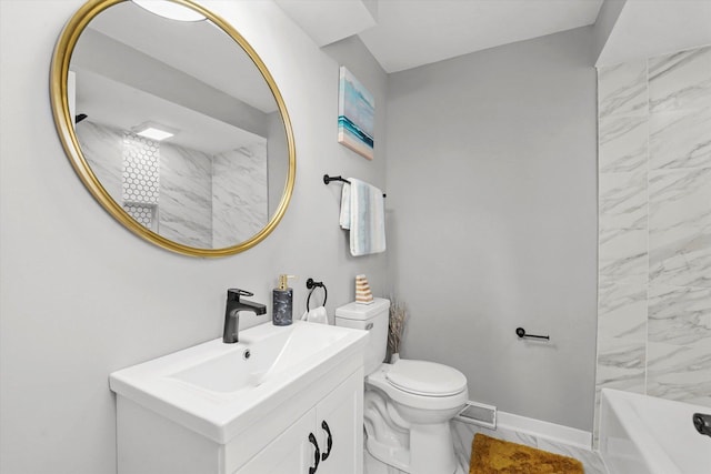 full bathroom with vanity, toilet, and tiled shower / bath