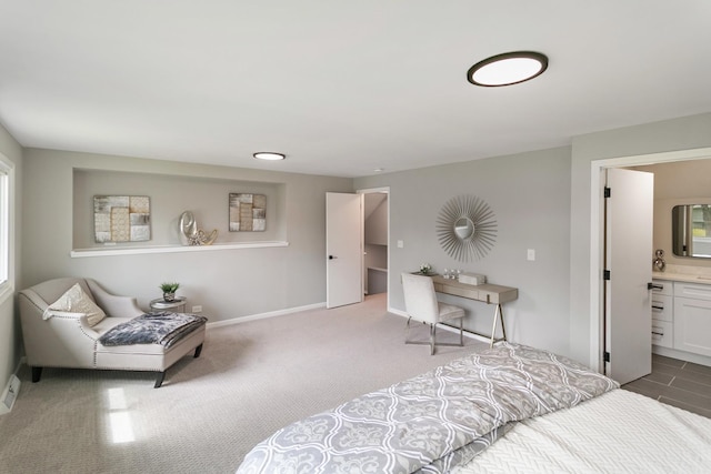 7S135 Clover Ct, Naperville, IL 60540 - carpeted bedroom with ensuite bathroom and baseboards