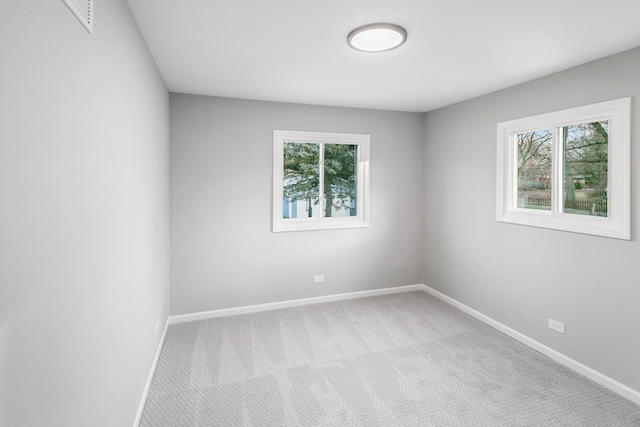 7S135 Clover Ct, Naperville, IL 60540 - spare room with baseboards and carpet