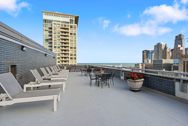 view of patio / terrace featuring a water view