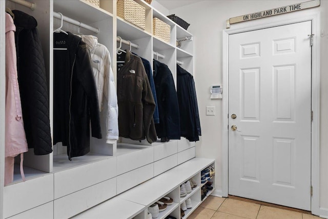 mudroom featuring light tile patterned flooring