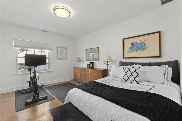 bedroom featuring light hardwood / wood-style floors