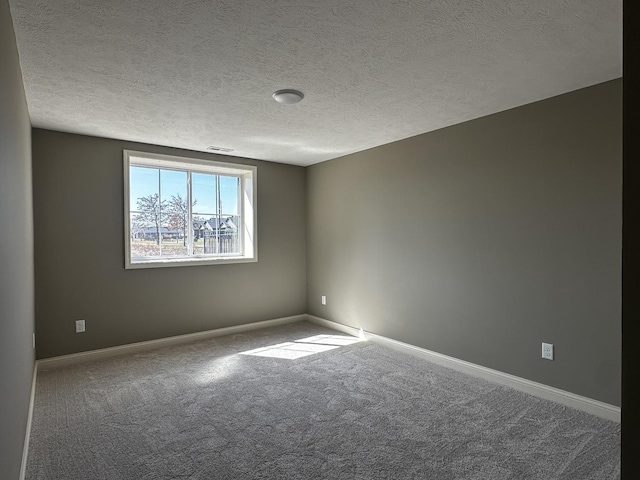 2523 Marble, Normal, IL 61761 - carpeted empty room featuring visible vents, baseboards, and a textured ceiling