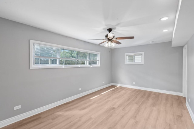 unfurnished room featuring light hardwood / wood-style flooring and ceiling fan