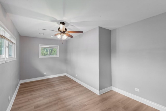 spare room featuring light hardwood / wood-style floors