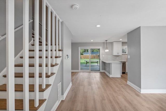 interior space with hardwood / wood-style floors