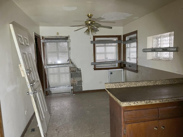 kitchen featuring ceiling fan