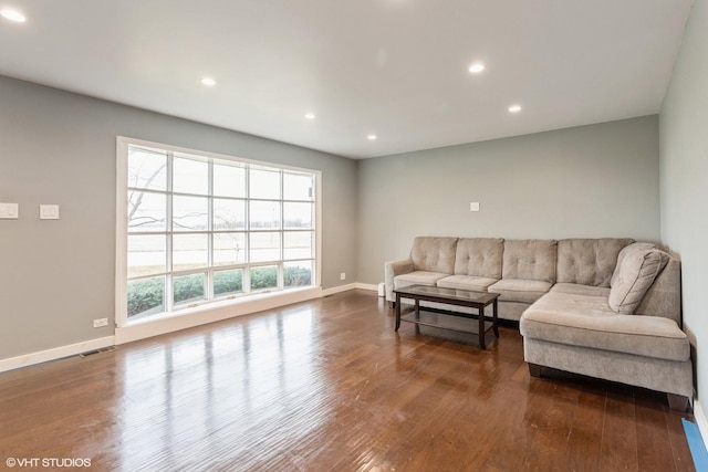 living room featuring dark hardwood / wood-style flooring