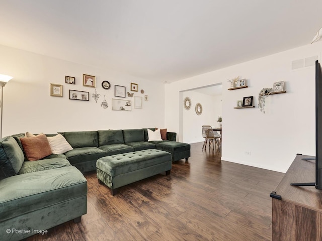 living room featuring dark hardwood / wood-style flooring