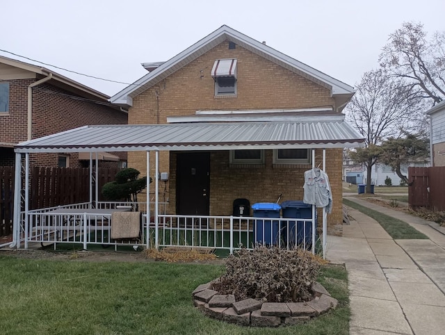 back of house featuring a porch