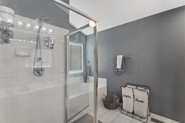 bathroom with tile patterned floors, an enclosed shower, and lofted ceiling