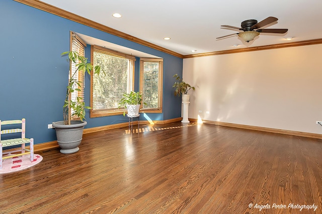 living room with dark hardwood / wood-style flooring, ceiling fan, and crown molding