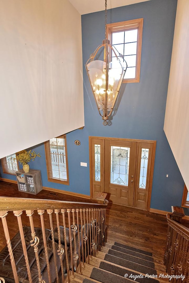 hallway with light colored carpet