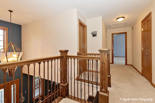 carpeted bedroom with a skylight, ceiling fan, high vaulted ceiling, and ensuite bathroom