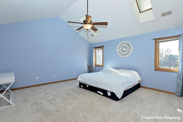 walk in closet featuring lofted ceiling and light carpet