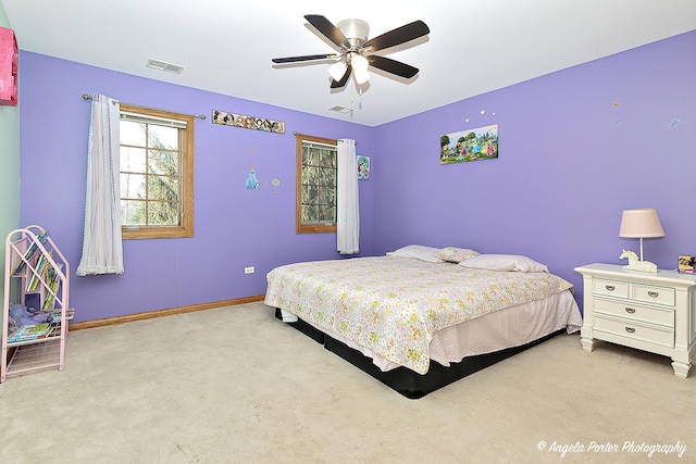 carpeted bedroom with ceiling fan