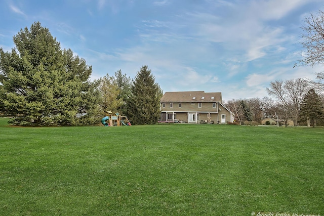 view of yard with a playground