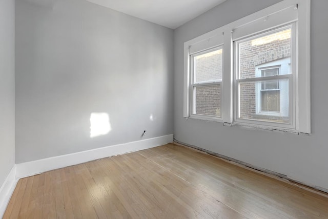 empty room featuring light hardwood / wood-style floors