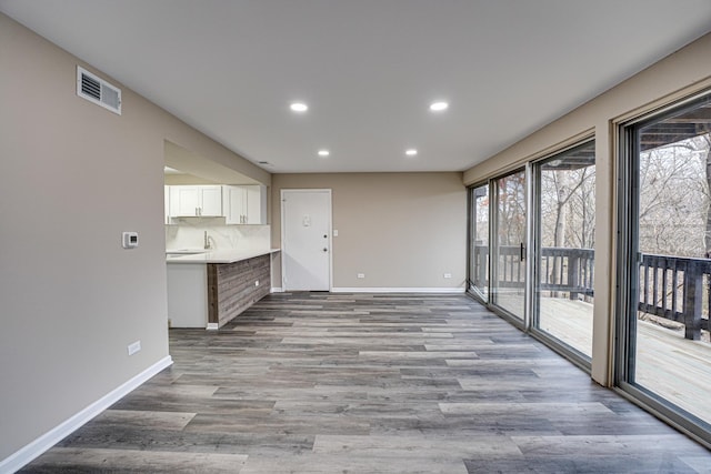 interior space with light hardwood / wood-style flooring