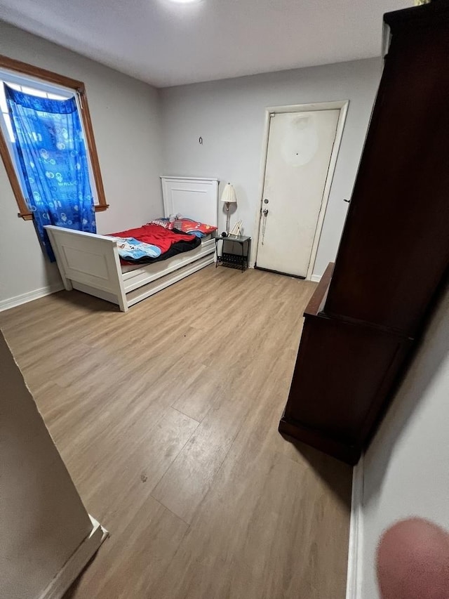 bedroom featuring light hardwood / wood-style flooring