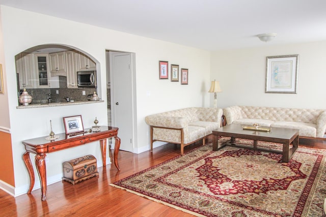 living room with wood-type flooring