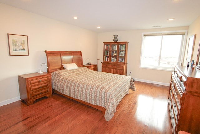 bedroom featuring wood-type flooring