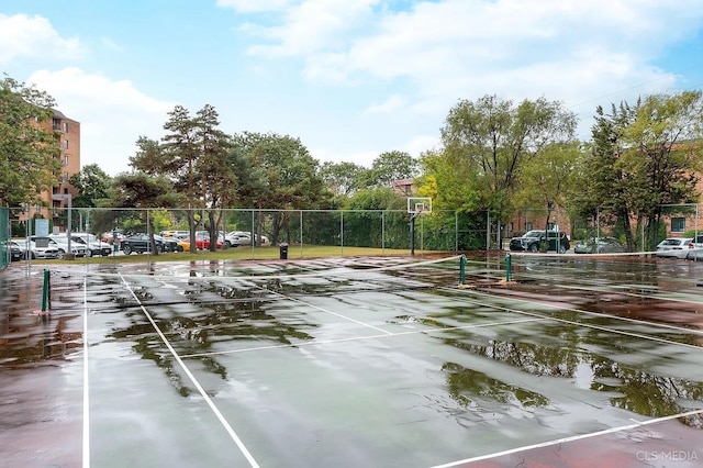 view of home's community with basketball court and tennis court