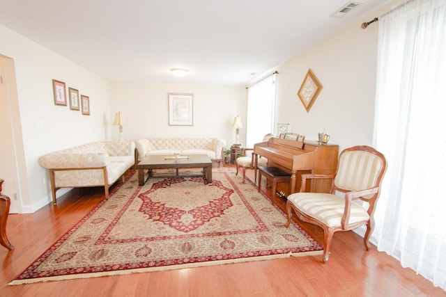 living room with hardwood / wood-style flooring