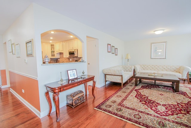 living room with hardwood / wood-style floors