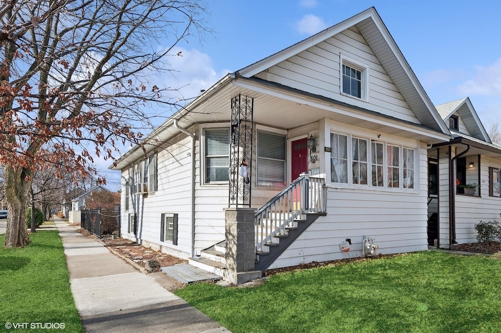 bungalow with a front lawn