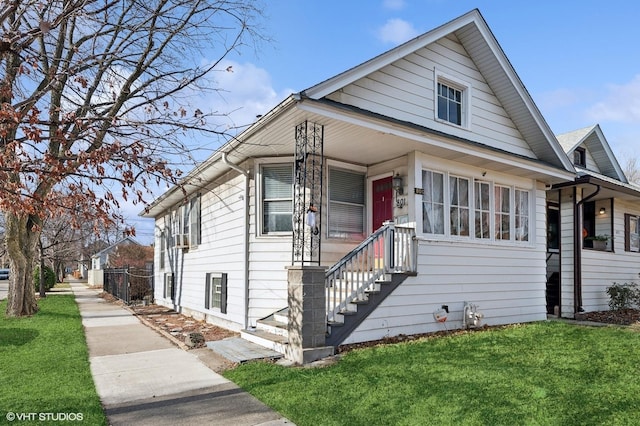 bungalow with a front lawn